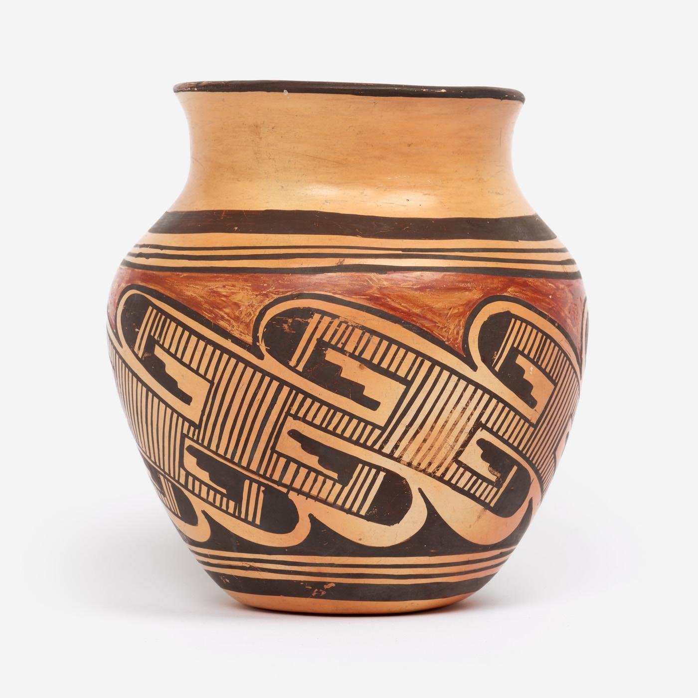 Appraisal: POLYCHROME DECORATED PUEBLO POTTERY SEED JAR A Pueblo pottery seed