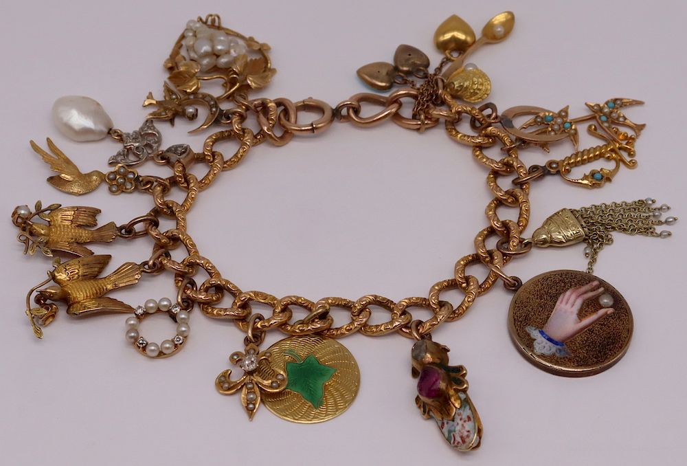 Appraisal: JEWELRY Victorian kt Gold Charm Bracelet and Charms Victorian kt