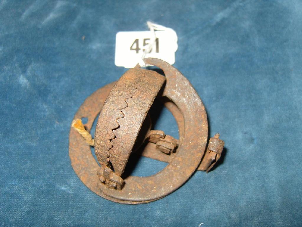 Appraisal: A th century miniature cast man trap -