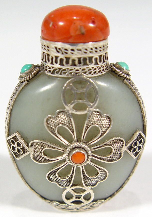 Appraisal: Chinese Celedon jade snuff bottle with white metal mount and