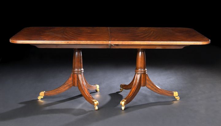 Appraisal: George III-Style Flame Mahogany Dining Table the rounded rectangular highly