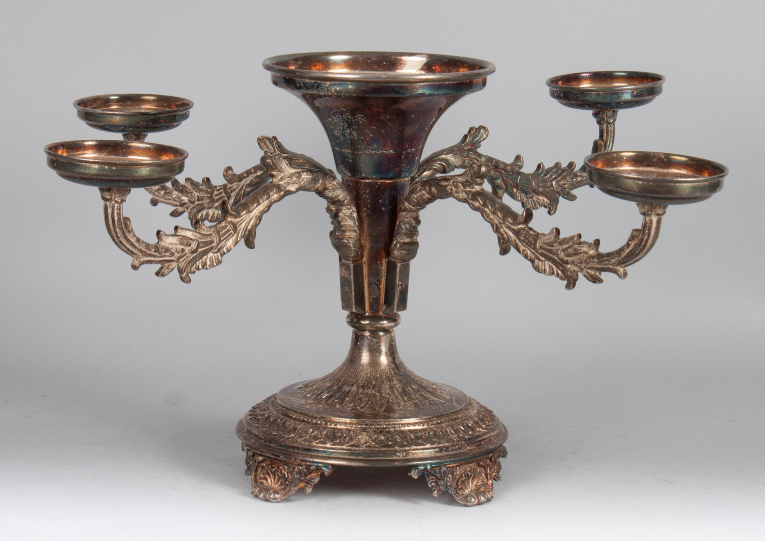 Appraisal: Sheffield silver-plated footed epergne silver-plate on copper missing glass inserts