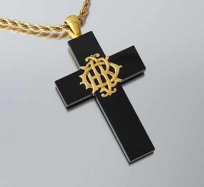 Appraisal: An Oversized Onyx Cross with Overlaid Gold Initials Large onyx