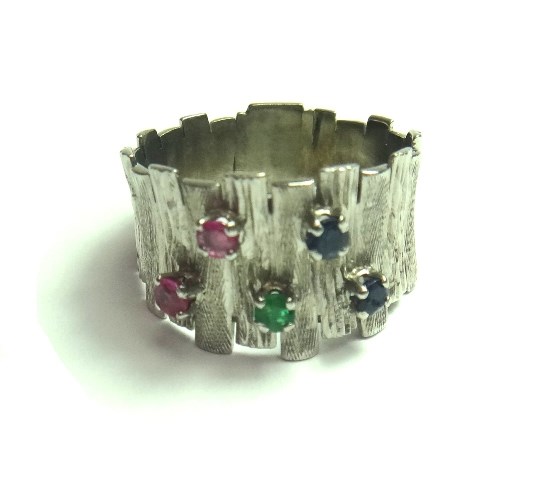 Appraisal: A ruby sapphire and emerald set ring in a bark