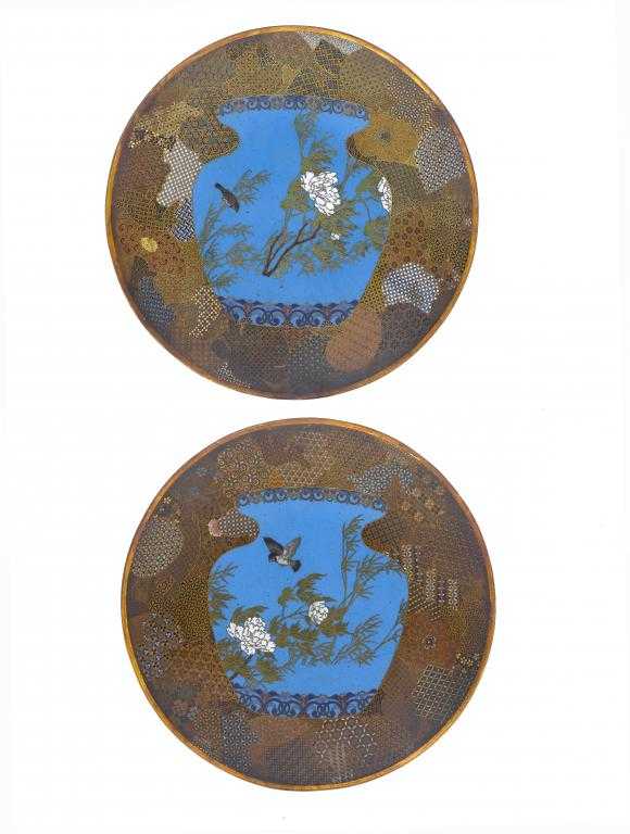 Appraisal: A PAIR OF JAPANESE CLOISONN ENAMEL PLAQUES with a bird