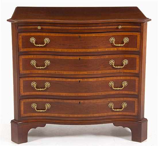 Appraisal: Georgian style inlaid mahogany serpentine chest of drawers serpentine top