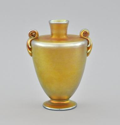 Appraisal: A Tiffany Favrile Vase With Scroll Handles Tapered gold favrile