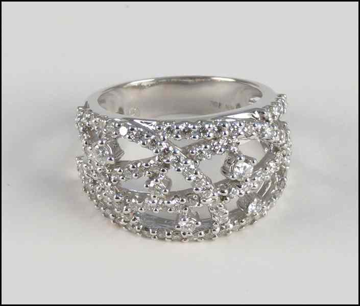 Appraisal: DIAMOND AND KARAT WHITE GOLD RING Round diamonds are G-I