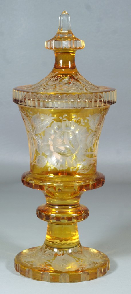 Appraisal: Engraved amber to clear Bohemian glass pokal round scalloped base