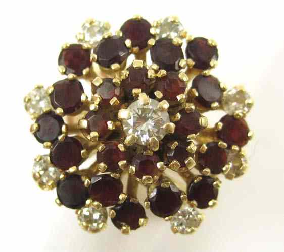 Appraisal: DIAMOND GARNET AND FOURTEEN KARAT GOLD RING set with round-cut