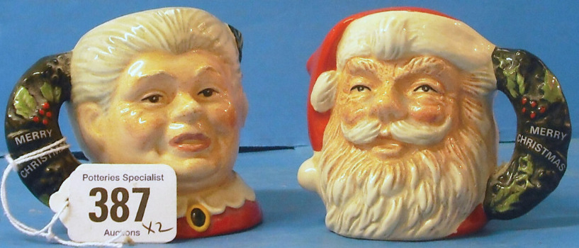 Appraisal: Royal Doulton Miniature Character Jugs Santa Claus D and Mrs