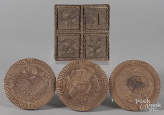 Appraisal: Four carved butterprints th c to include an eagle example