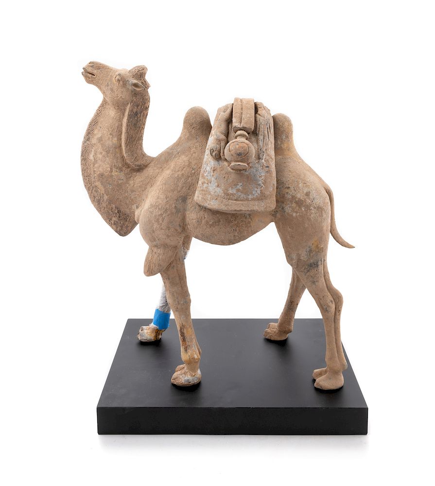 Appraisal: A Pottery Figure of a Bactrian Camel Height in cm