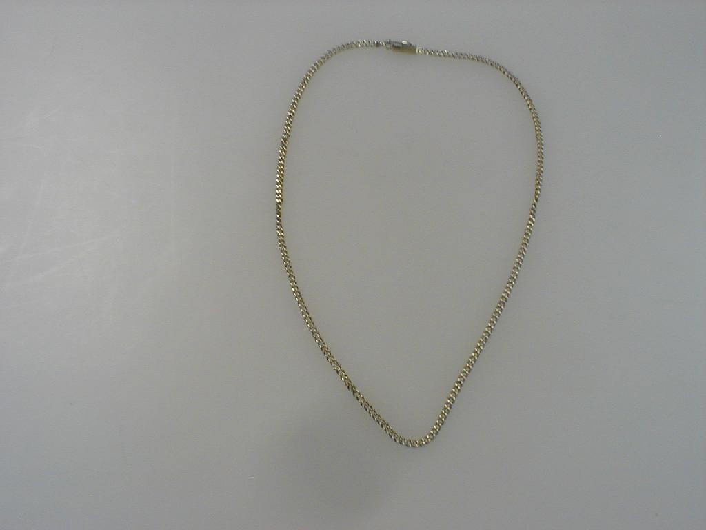 Appraisal: A curb link neck chain yellow metal stamped g