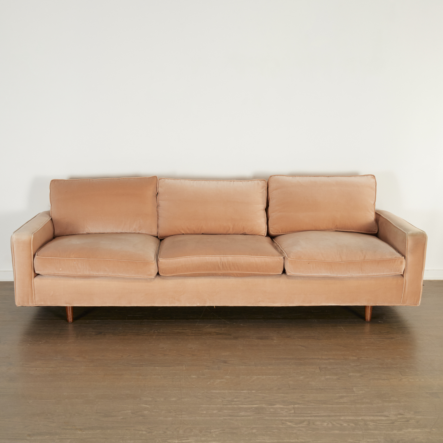 Appraisal: FLORENCE KNOLL THREE SEAT SOFA c s American stained walnut