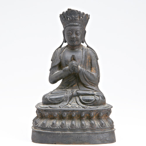 Appraisal: ORIENTAL BRONZE Seated Buddha figure with clasped hands and traces