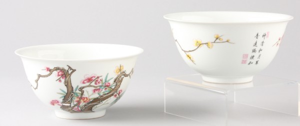 Appraisal: Bowls features white ground with floral and branch motif character