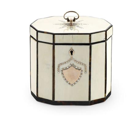 Appraisal: A George III ivory decagonal tea caddy with tortoiseshell stringing