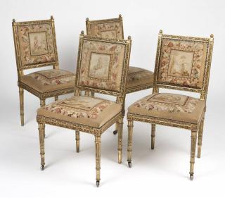 Appraisal: Four Louis XVI style carved and gilt wood chairs Late