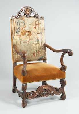 Appraisal: A Grand Carved Wood and Upholstered Arm Chair The carved