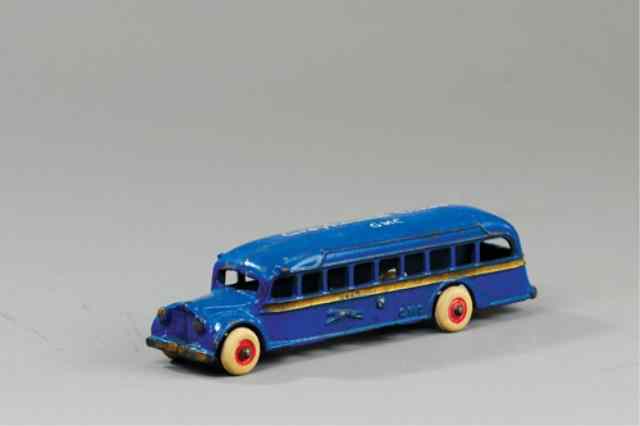 Appraisal: ARCADE GMC GREYHOUND BUS Cast iron painted in blue body