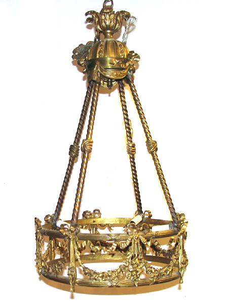 Appraisal: A Rococo style brass four light chandelier height in diameter