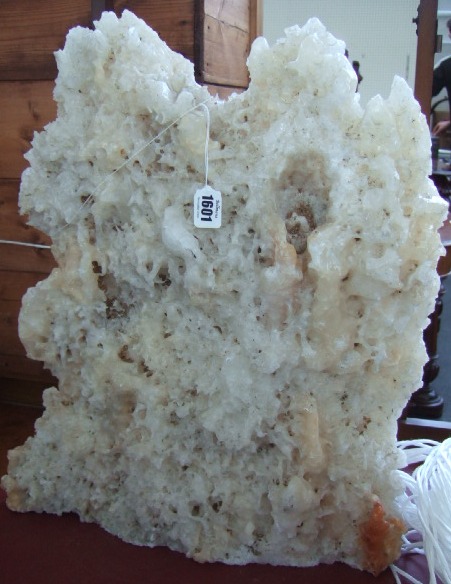 Appraisal: A white mineral geological specimen of naturalistic form cm high