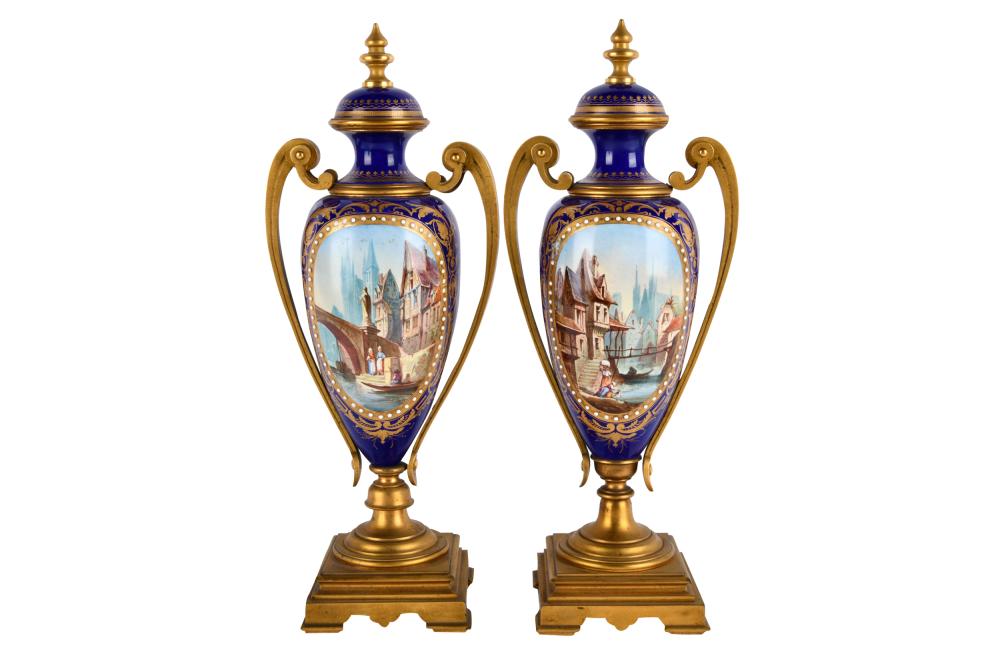 Appraisal: PAIR SEVRES-STYLE GILT METAL-MOUNTED URNSunmarked with applied enamel decoration and