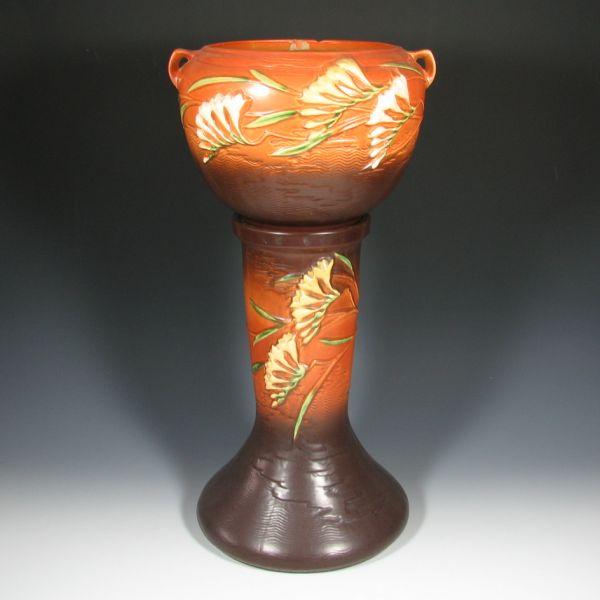 Appraisal: Roseville brown Freesia jardiniere and pedestal Jardiniere is marked Roseville