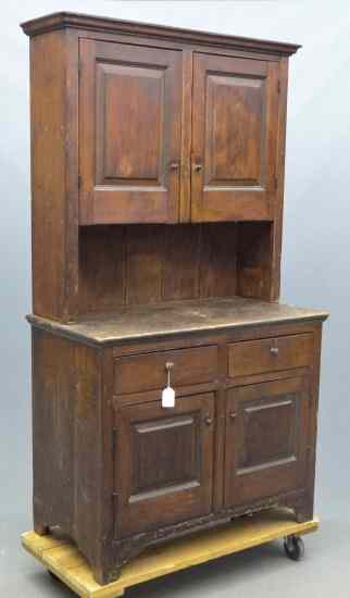 Appraisal: th c two part stepback cupboard Top has two raised