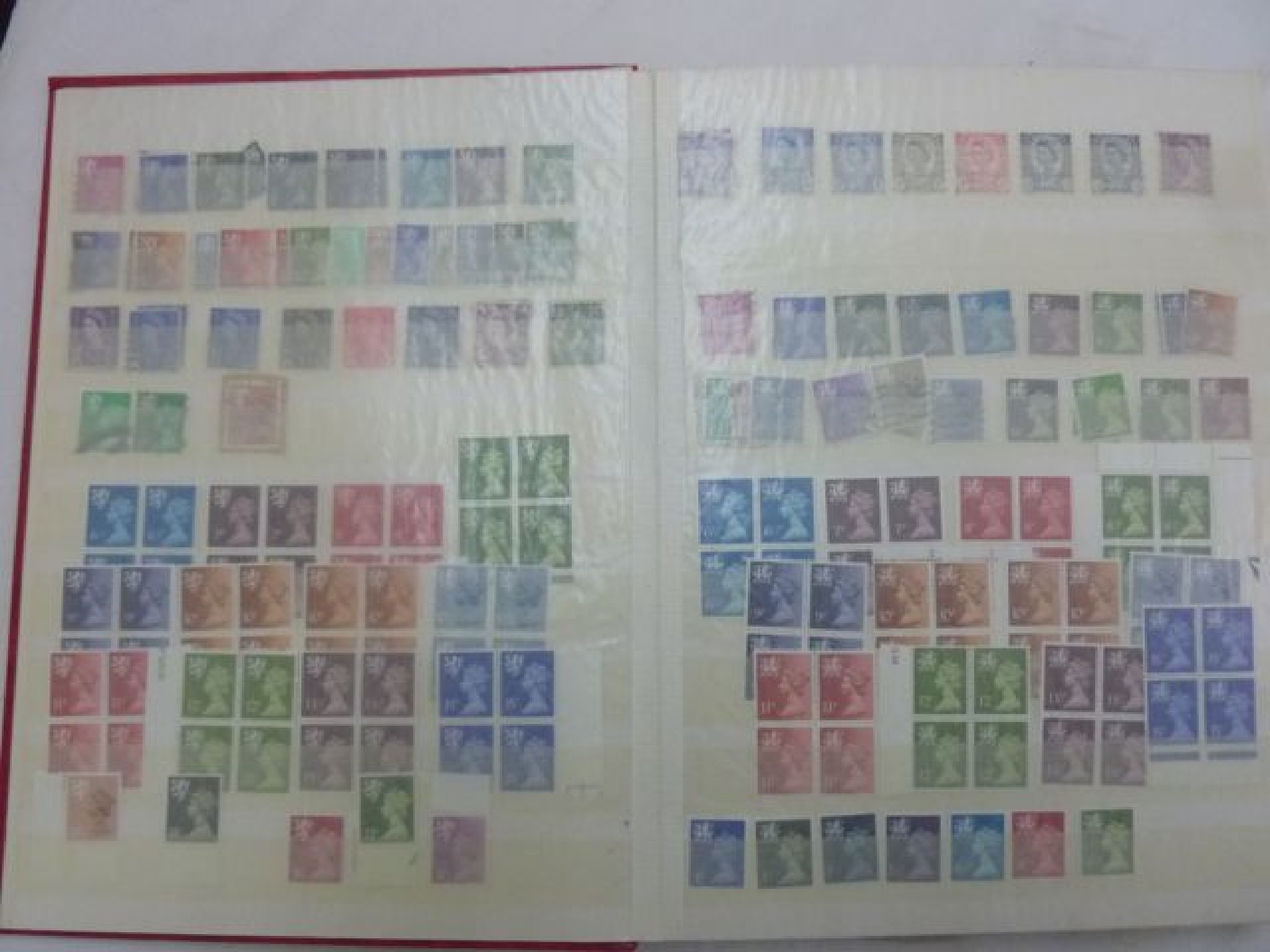 Appraisal: Three albums containing a quantity of British stamps and stamp