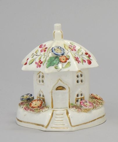 Appraisal: STAFFORDSHIRE COTTAGE-FORM PASTILLE BURNER Circa With colorful painted and relief