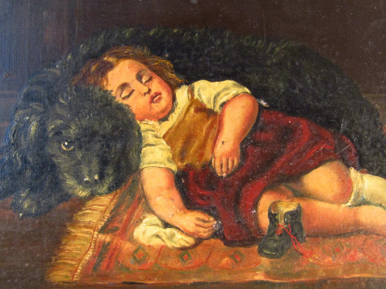 Appraisal: thC English School A child asleep aside dog oil on