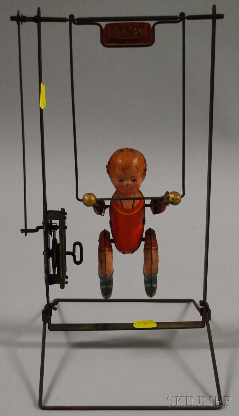 Appraisal: Lithographed Tin Tik Tak Wind-up Acrobat Toy c ht -