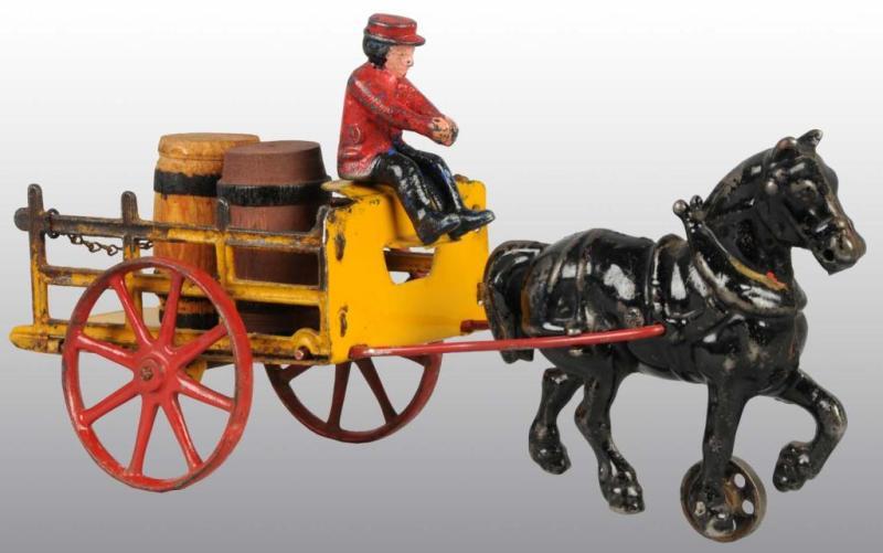 Appraisal: Cast Iron Tin Hubley Dray Toy Description Includes two wood