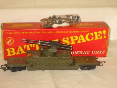 Appraisal: Triang Hornby wagons and accessories including a Battle Space tank