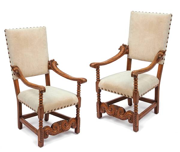 Appraisal: A pair of Charles II style walnut upholstered armchairs height