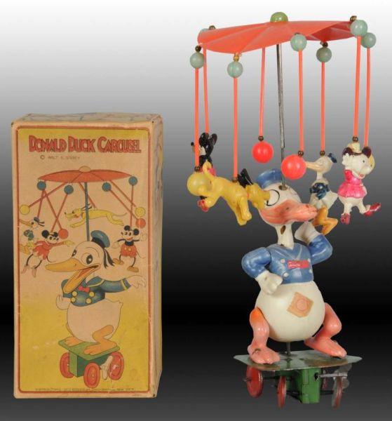 Appraisal: Walt Disney Celluloid Donald Duck Carousel Toy Description Includes rare