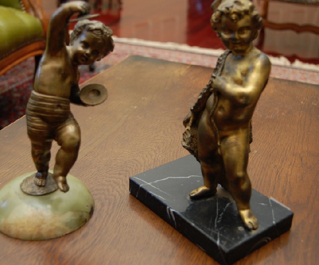 Appraisal: TWO TH CENTURY GILT BRONZE FIGURES OF PUTTI One with