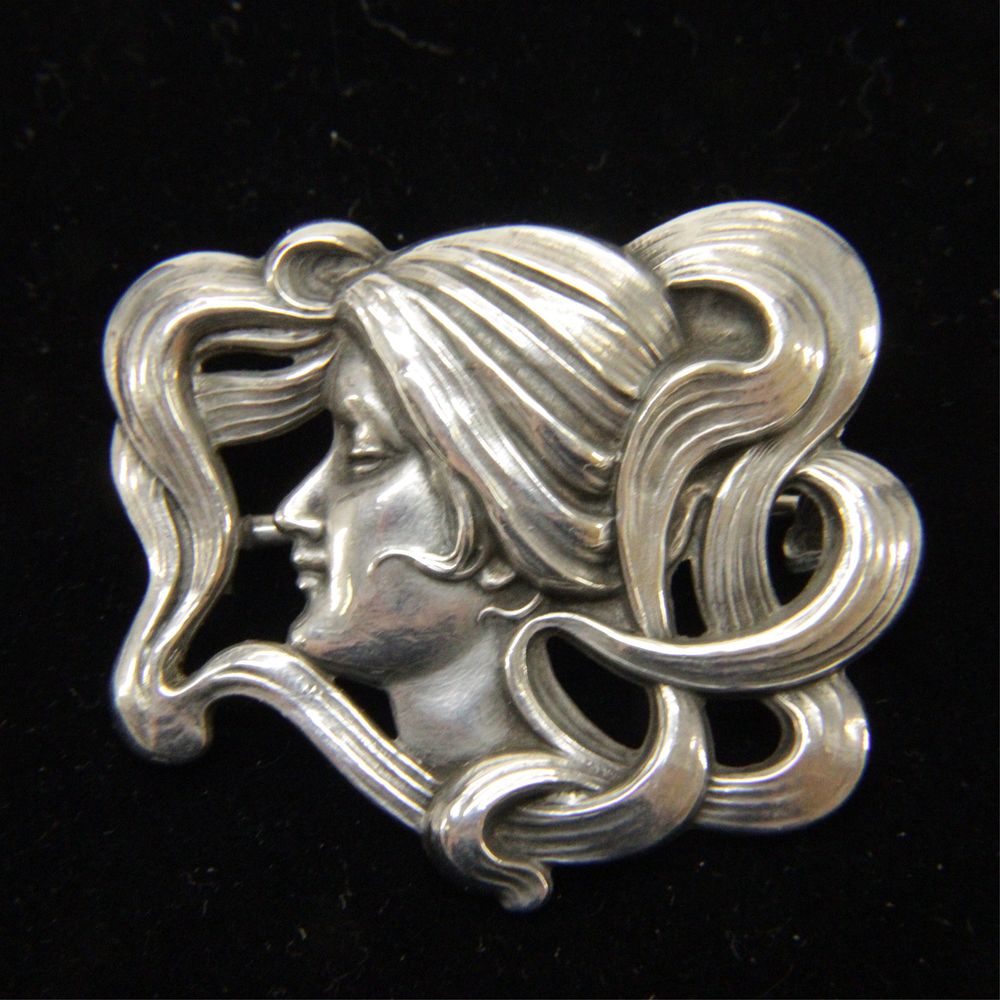 Appraisal: Art Nouveau Sterling Brooch of Woman's Head An art nouveau