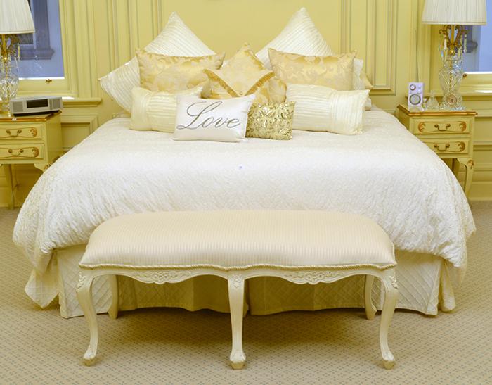 Appraisal: A KING SIZE BED WITH BED COVER AND CUSHIONS OTTOMAN