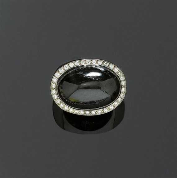 Appraisal: STAR DIOPSIDE AND BRILLIANT-CUT DIAMOND RING M KUNC White gold