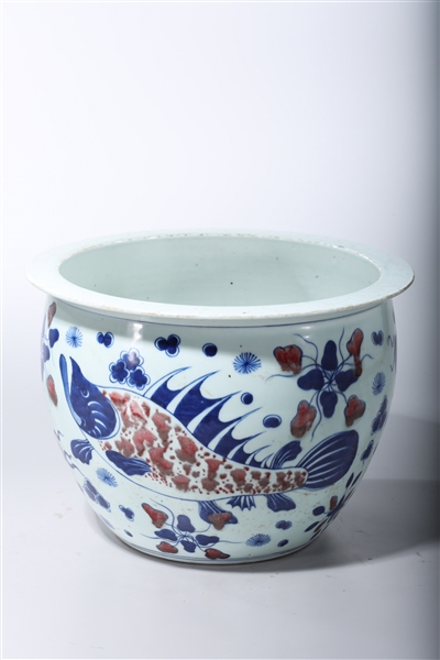 Appraisal: Chinese red blue and white porcelain jardiniere with fish motif