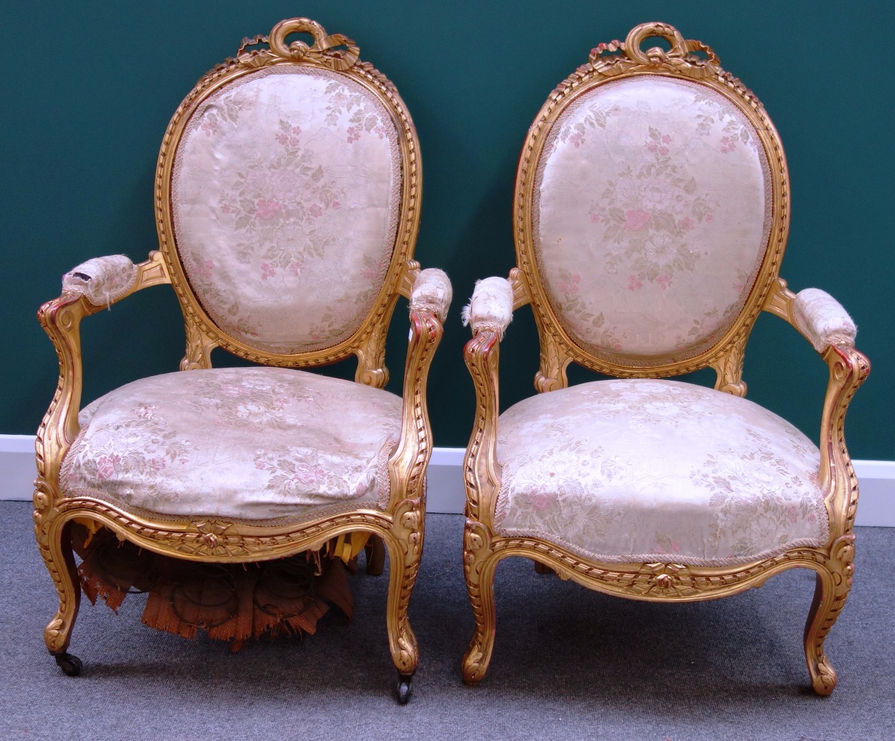 Appraisal: A pair of Louis XV style gilt framed fauteuils with