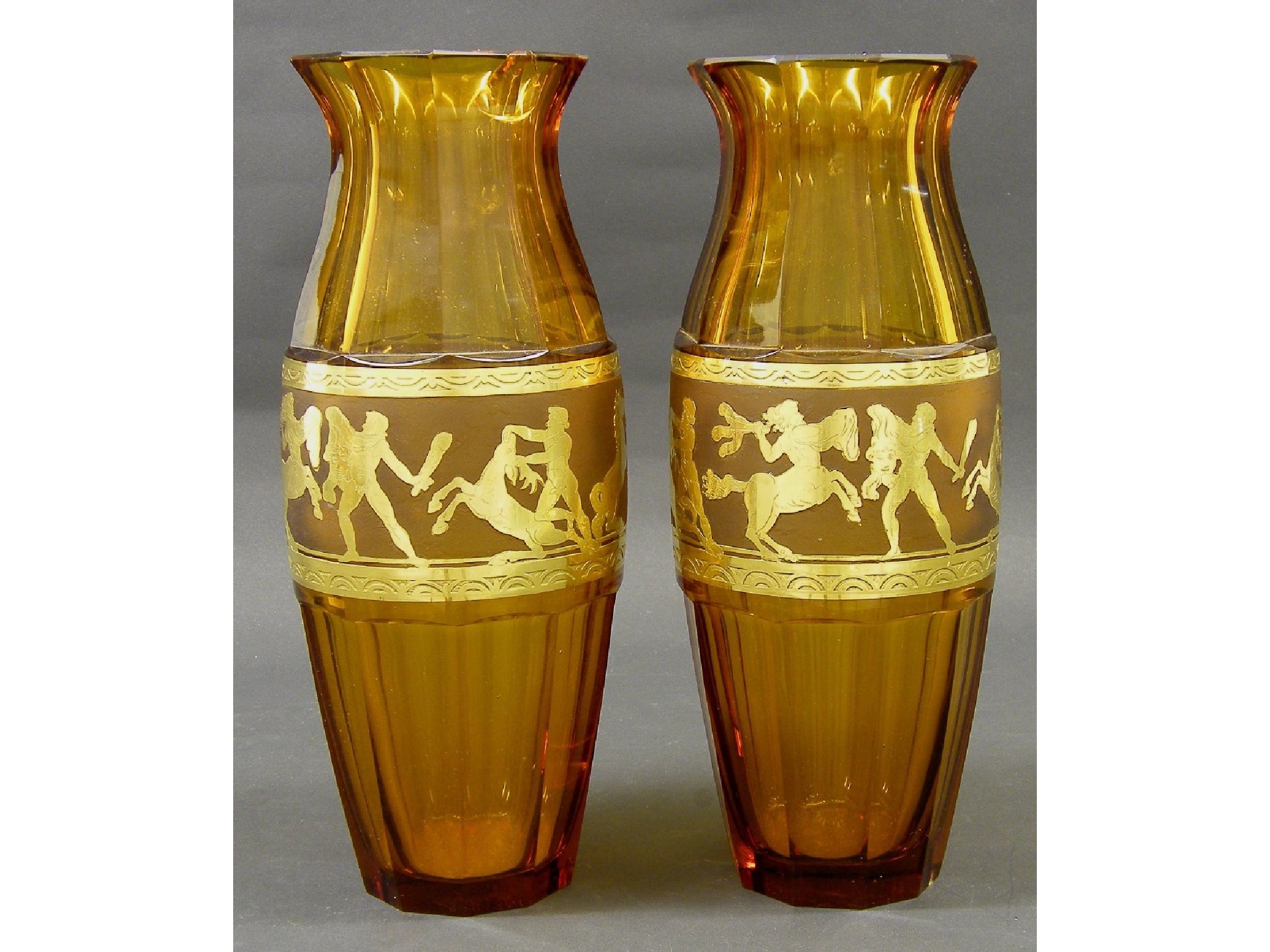 Appraisal: Attractive pair of Bohemian faceted amber glass vases decorated with