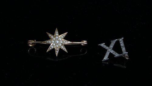 Appraisal: A pearl set starburst brooch on a ct gold bar