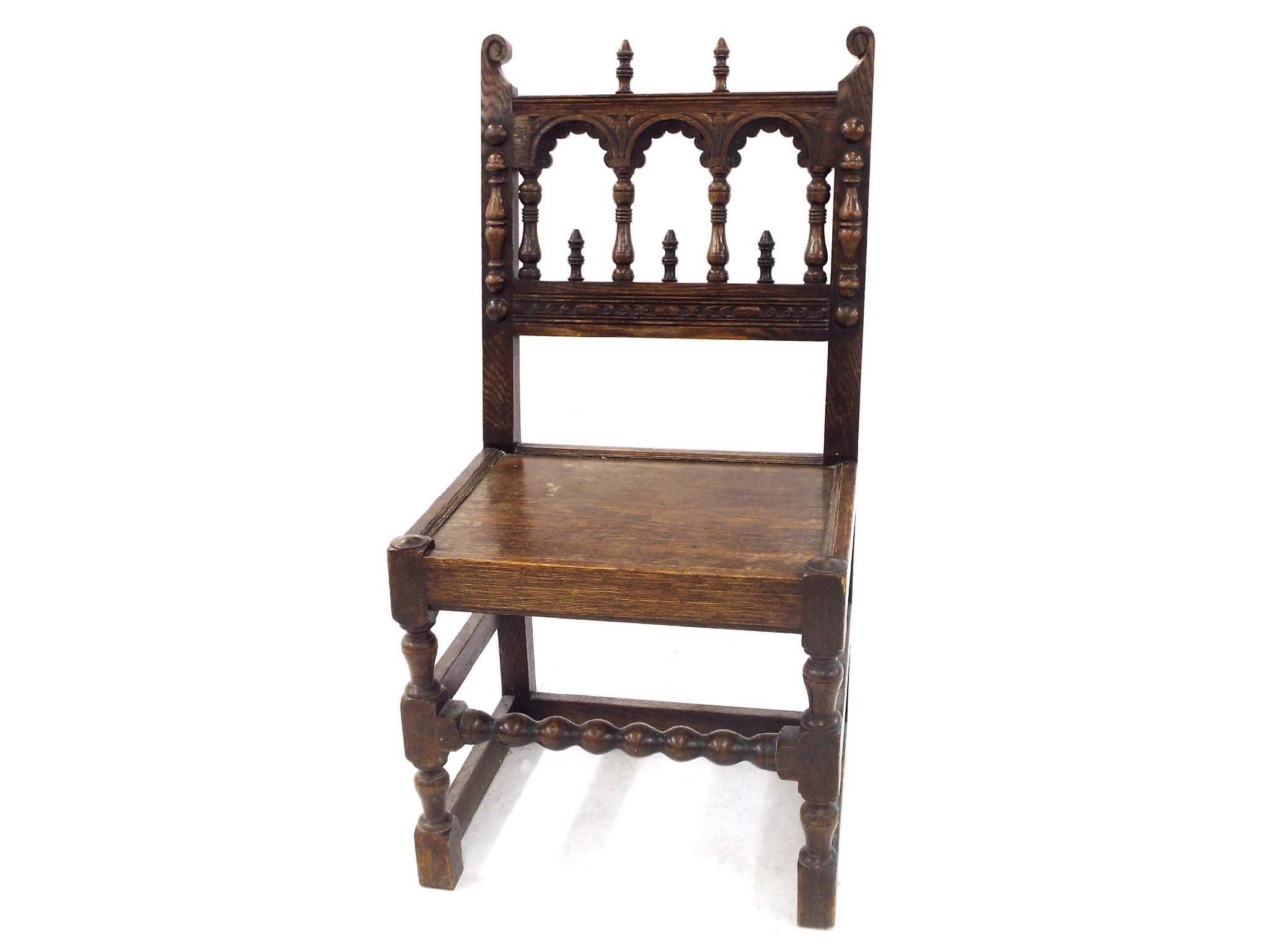 Appraisal: Antique oak wainscot type chair the back carved with arched