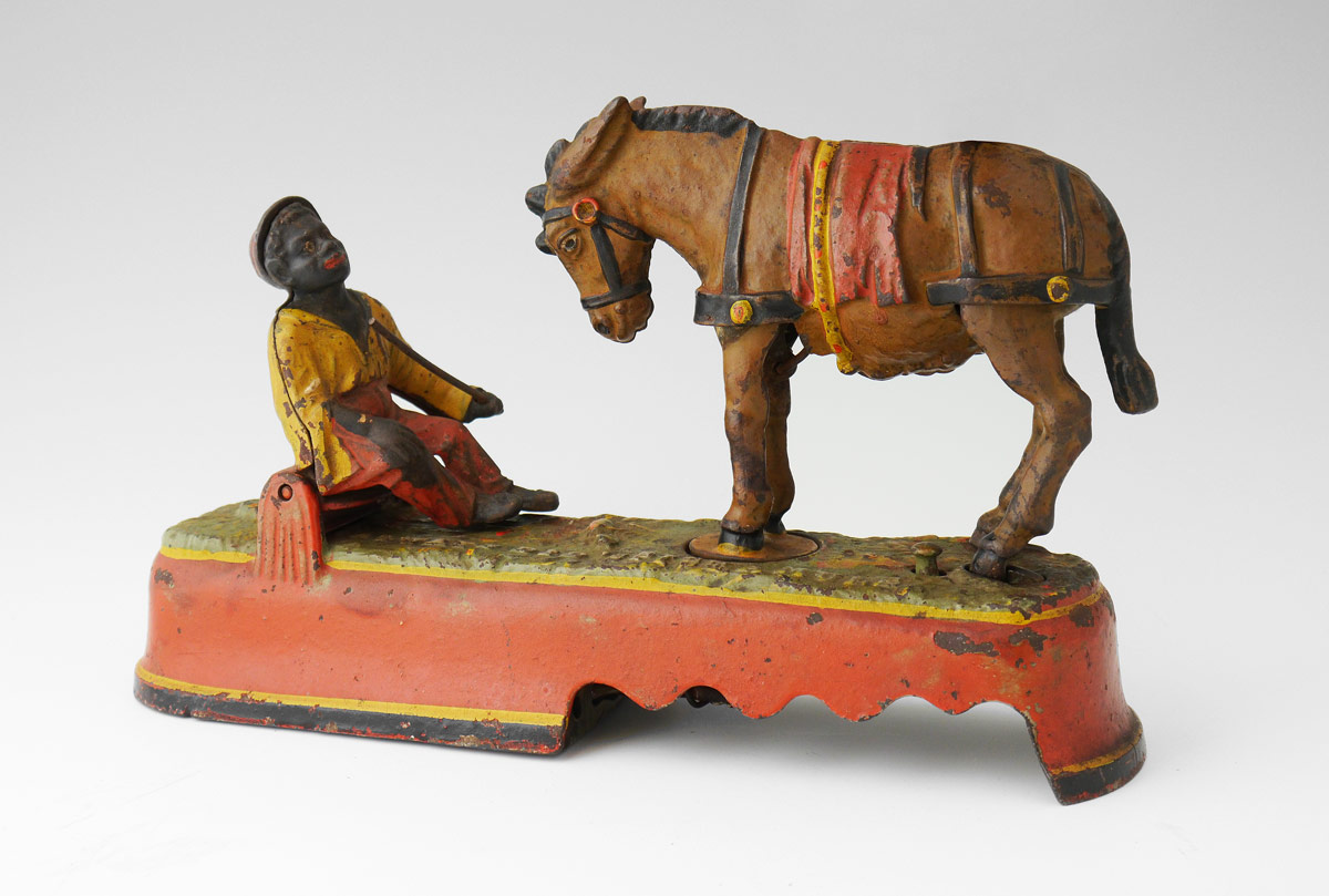 Appraisal: ALWAYS DID 'SPISE A MULE'' MECHANICAL BANK Cast iron mechanical