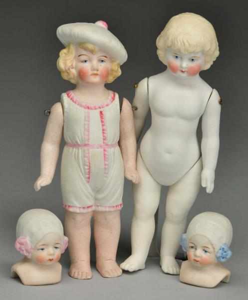 Appraisal: Lot of German All Bisque Dolls Heads Description Two Hertwig