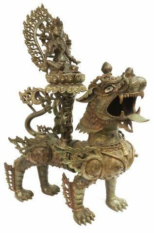 Appraisal: Large bronze foo lion with mounted Buddha figure likely Tibetan